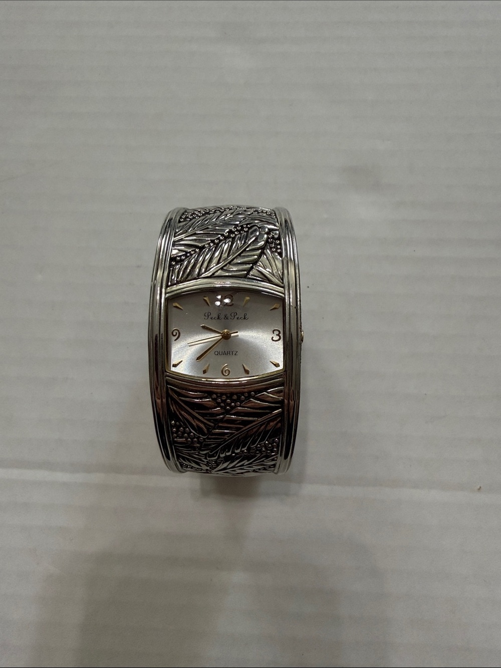 Peck & Peck Silver-Tone Leaf Embossed Bangle Watch